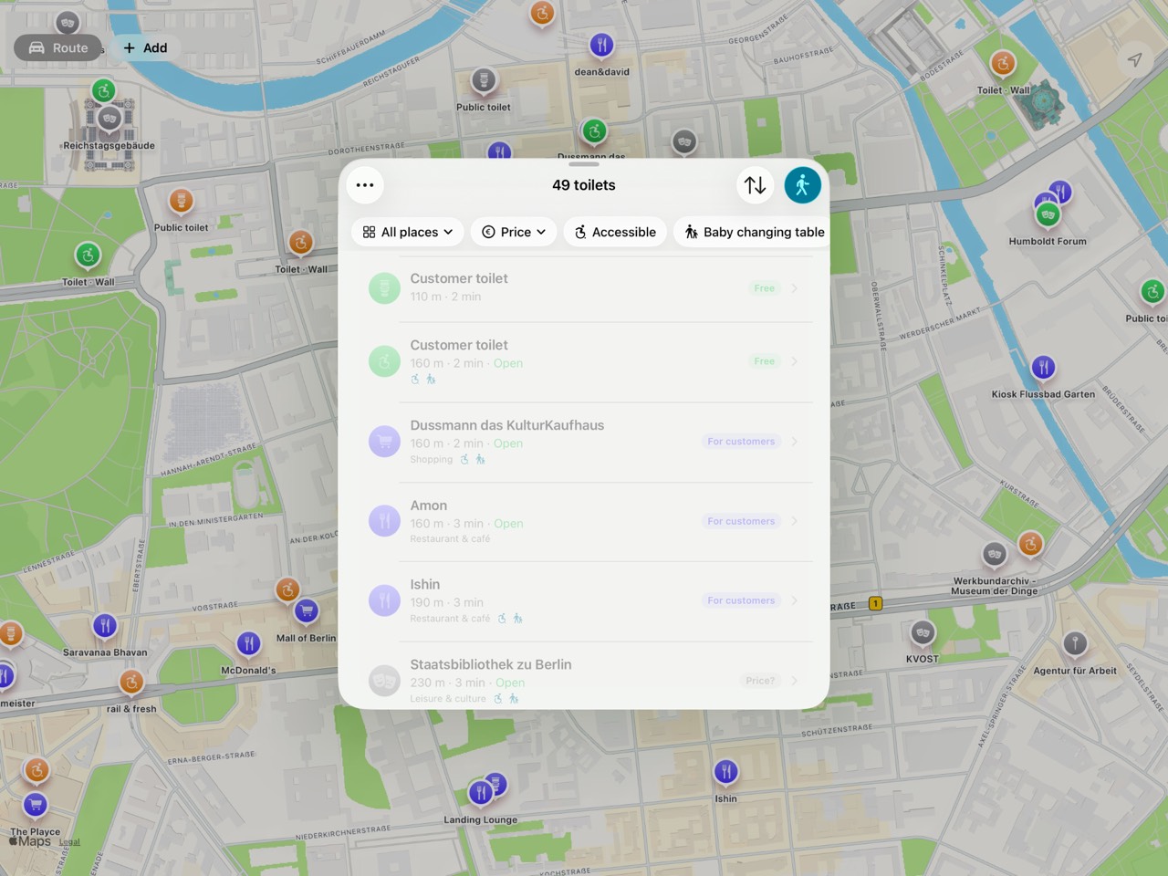 KloKompass on an iPad in landscape: a map of central Berlin fills the screen with a list of 49 toilets in front of it, showing distance, price and opening hours.